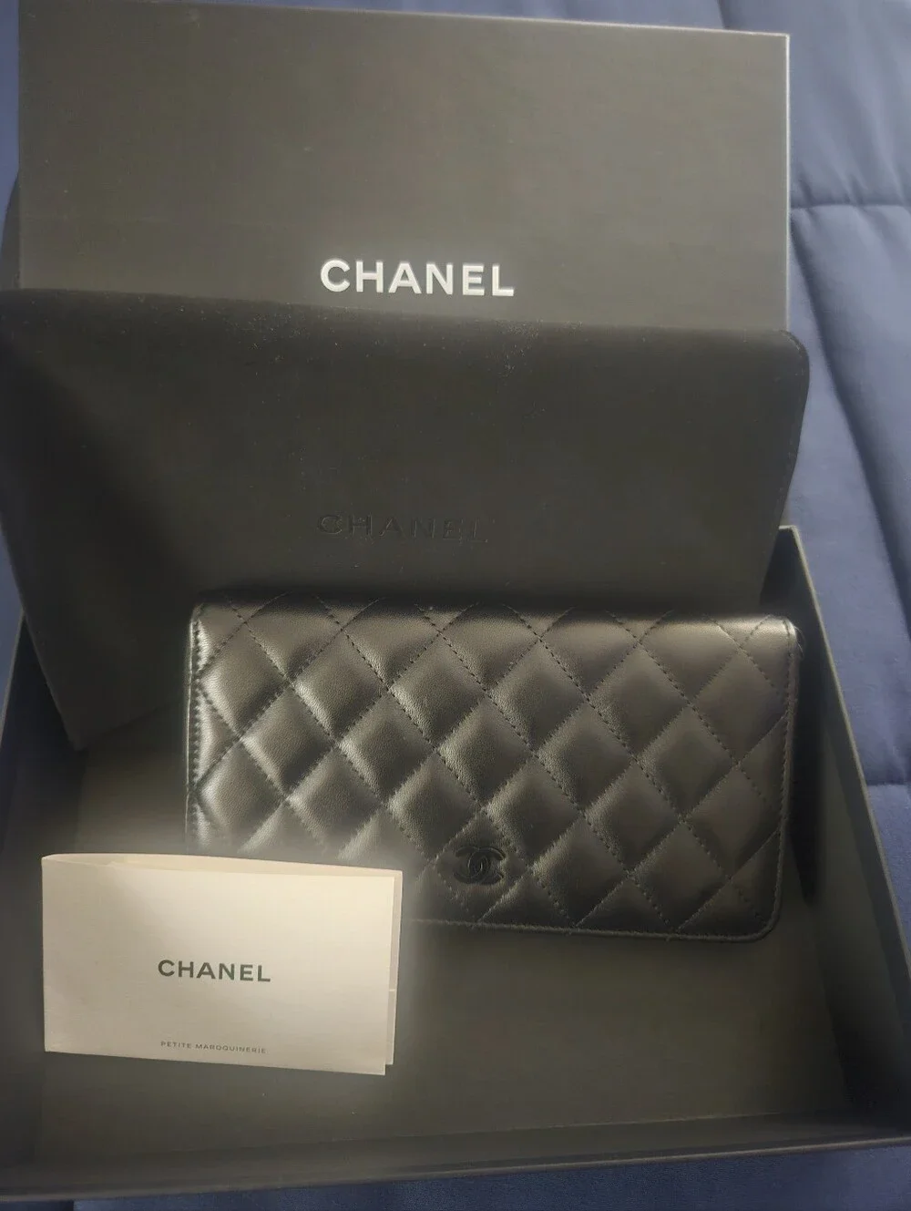 CHANEL Black Quilted Leather Clutch with CC Logo